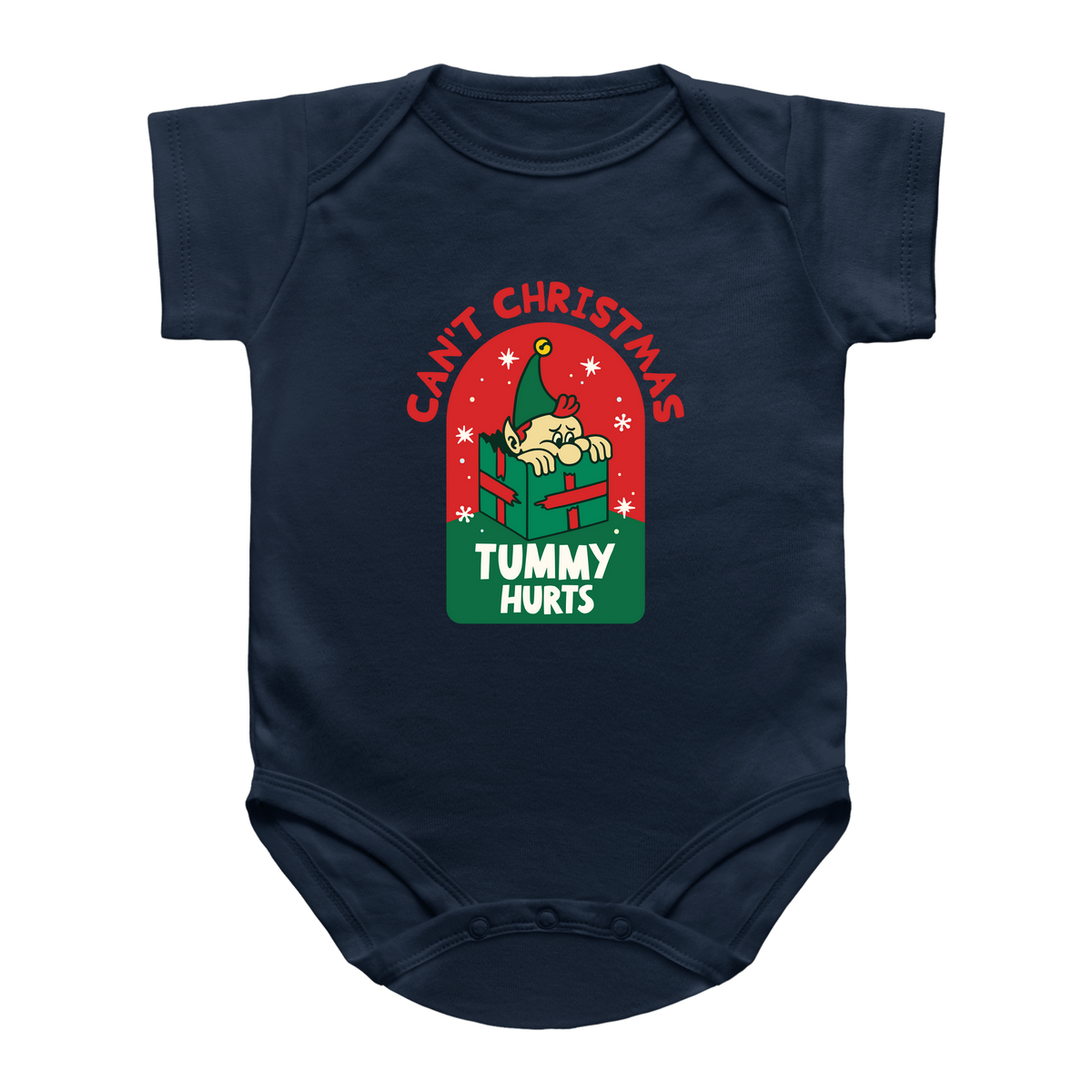 A navy blue baby bodysuit featuring a festive Christmas graphic on the chest. The graphic shows a cartoon elf sitting in a red gift box with the text &