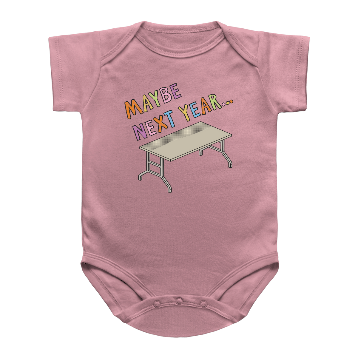 A pink short-sleeve baby bodysuit featuring a graphic print of a Thanksgiving folding table and the text &