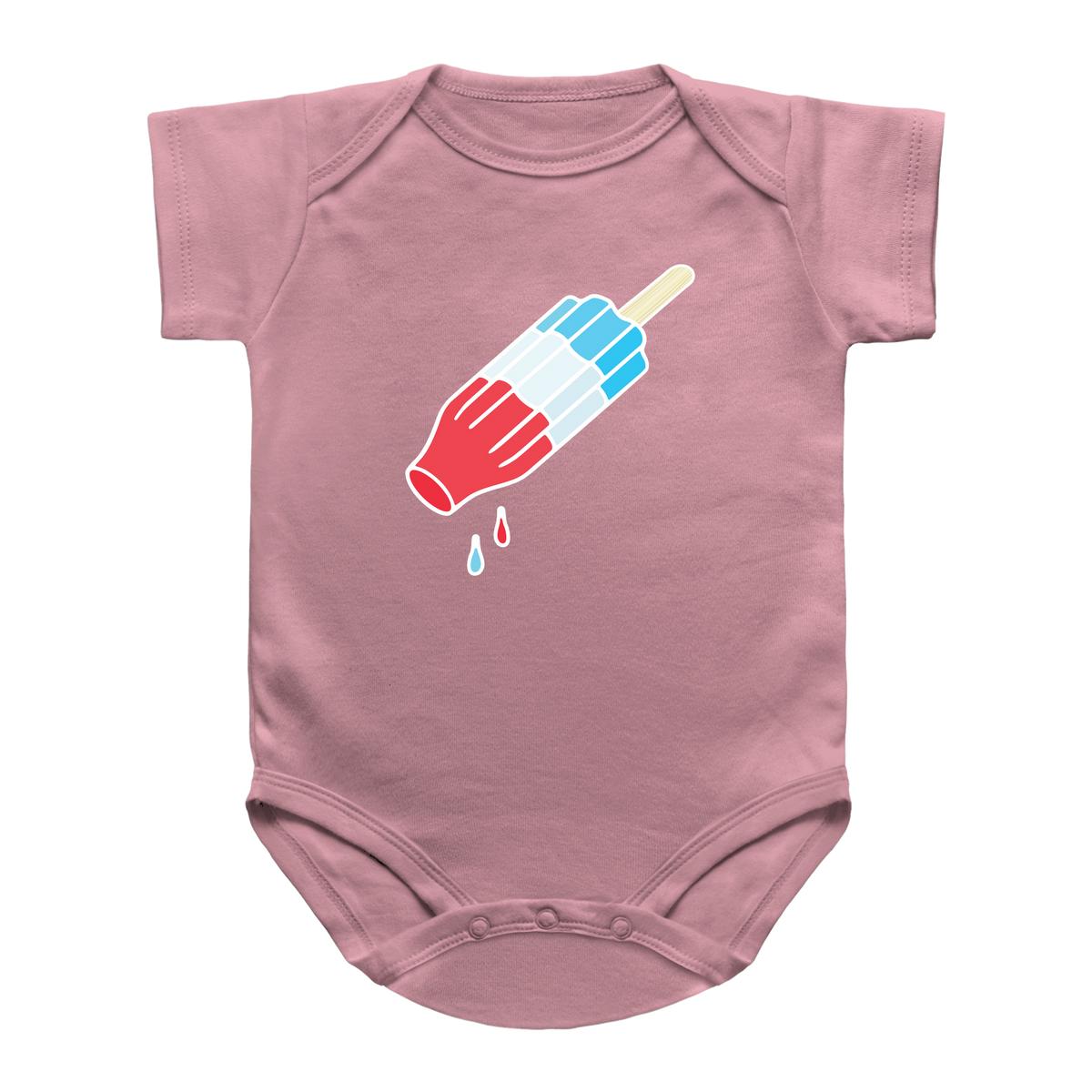 A pink short-sleeve infant onesie featuring a graphic of a rocket pop with red, white, and blue stripes. Meant for the 4th of July summer.