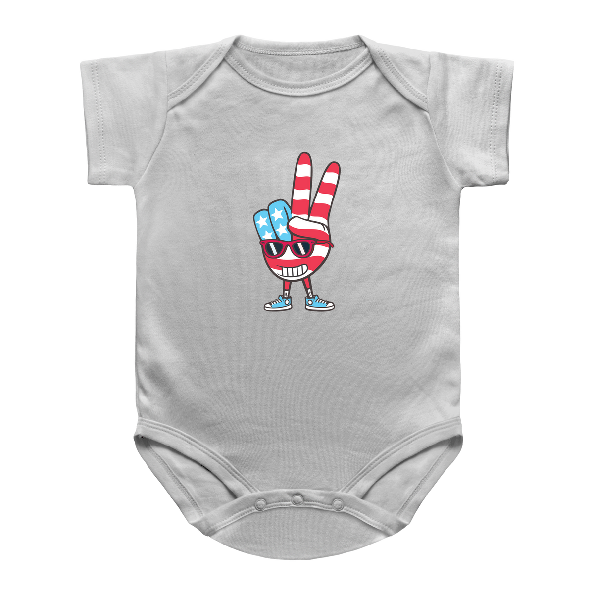 A white short-sleeve infant onesie featuring a cartoon graphic of a skull character wearing sunglasses and making a peace sign with its fingers, decorated in an American flag pattern of red and white stripes and blue stars.