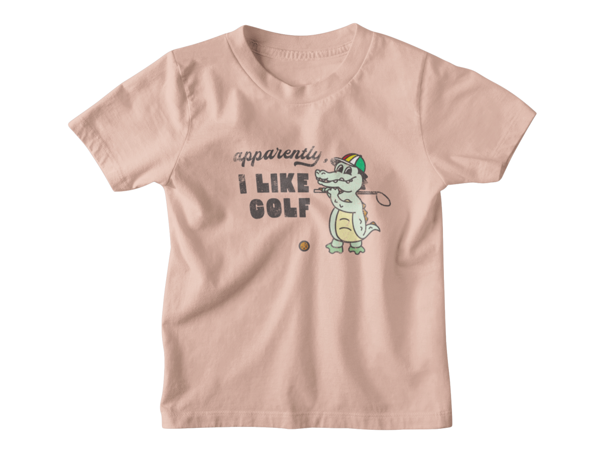 A light peach-pink short-sleeve t-shirt with a graphic on the front that reads &
