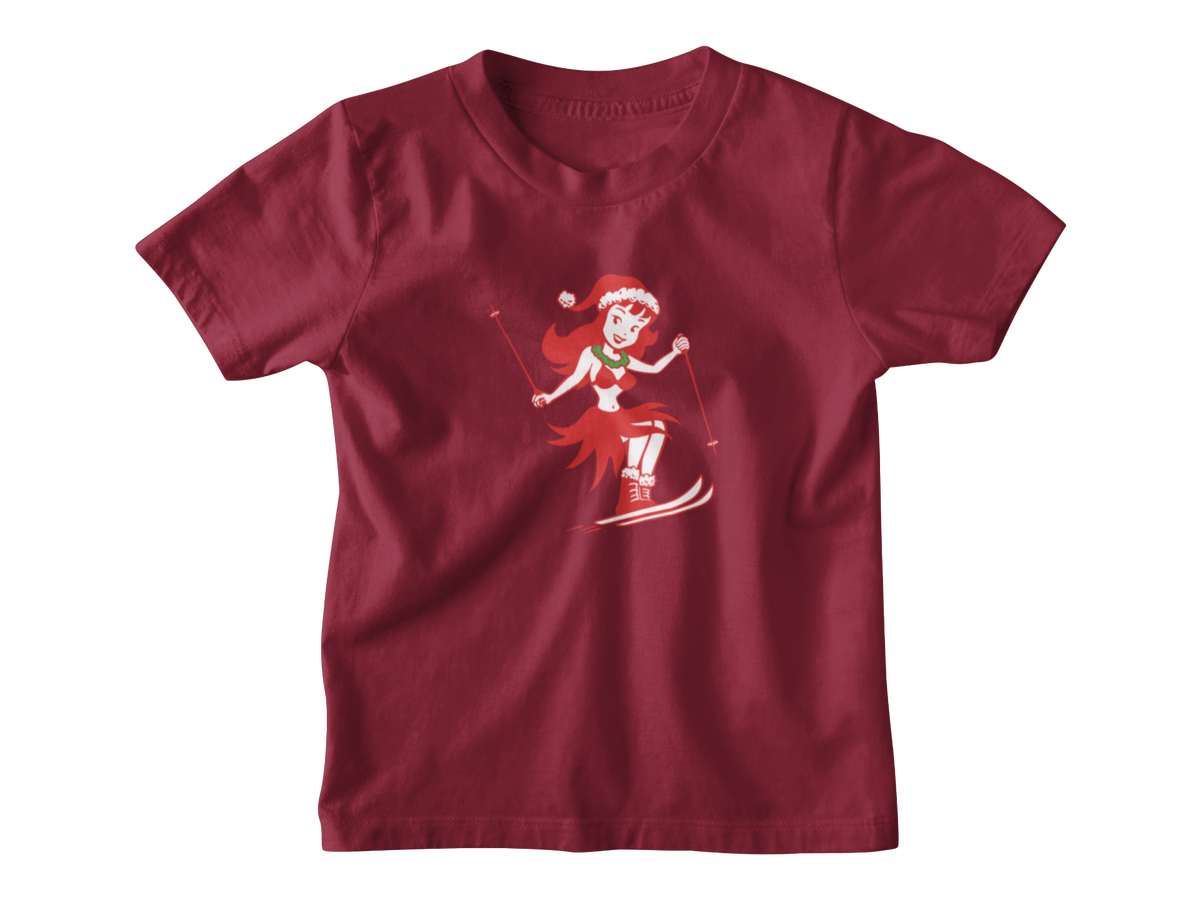 A dark red kids Christmas tee with a cartoon graphic of a Hawaiian hula dancer skiing in a red Santa hat.