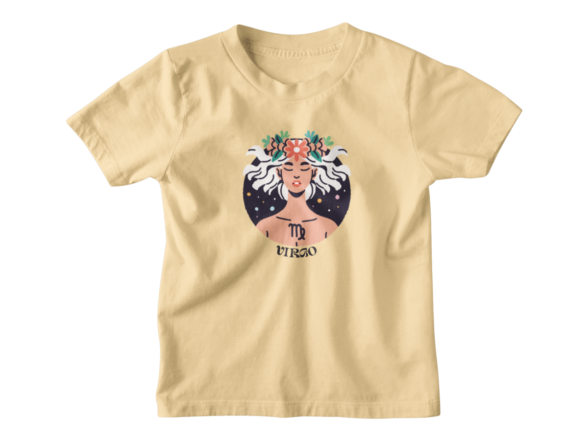 A yellow short-sleeve t-shirt with a graphic of the Virgo astrology sign, featuring a figure with white hair, a floral crown, and a starry background.