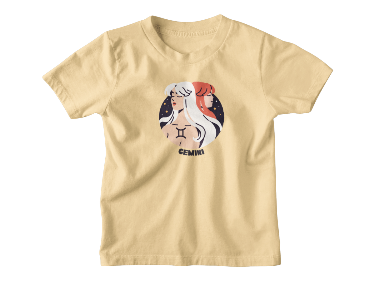 A light beige short-sleeve t-shirt with a circular graphic of a Gemini zodiac sign on the chest, displayed against a solid white background.
