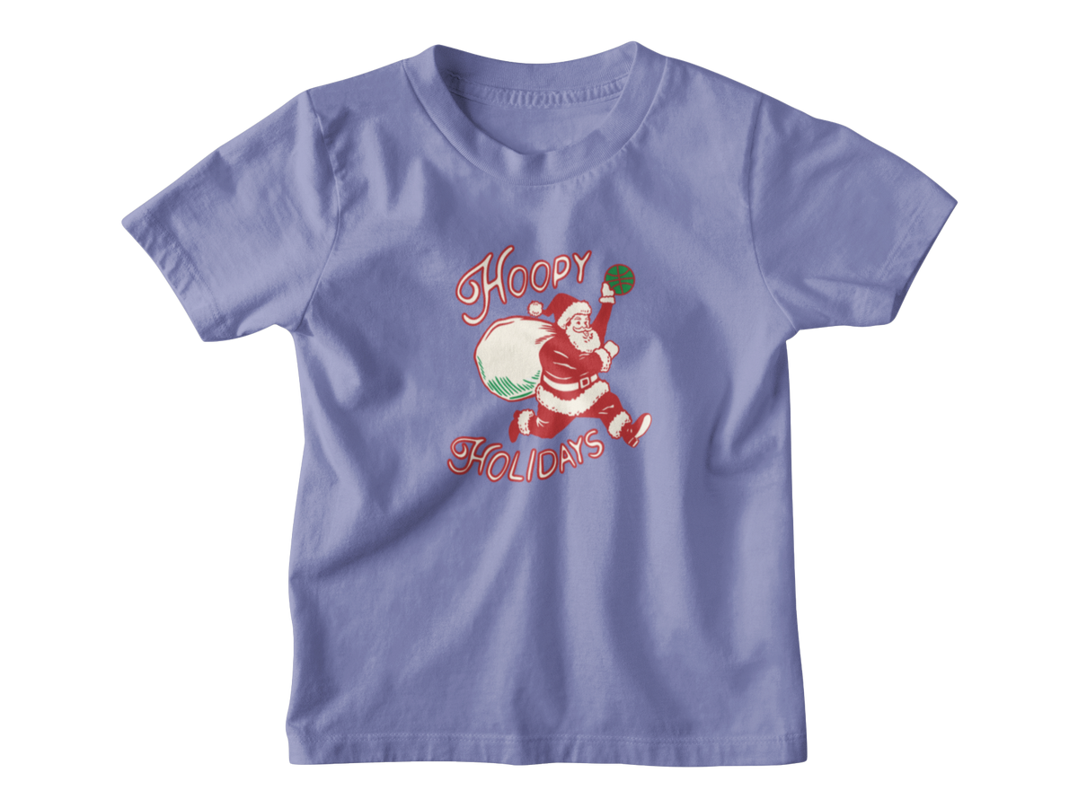 A violet short-sleeve t-shirt with a vintage-style Christmas graphic of Santa Claus running while carrying a sack, with the words &
