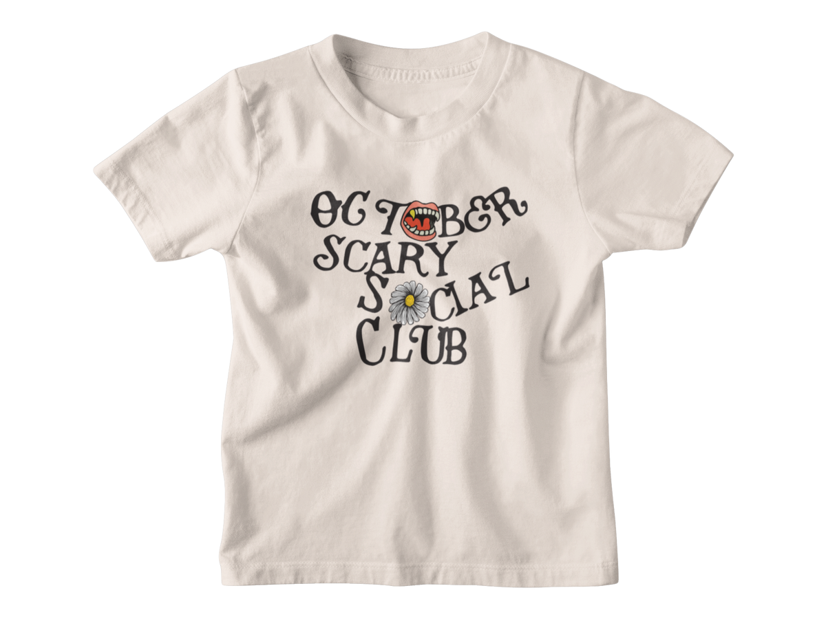 A light yellow kid short-sleeve t-shirt with a graphic on the front that reads &
