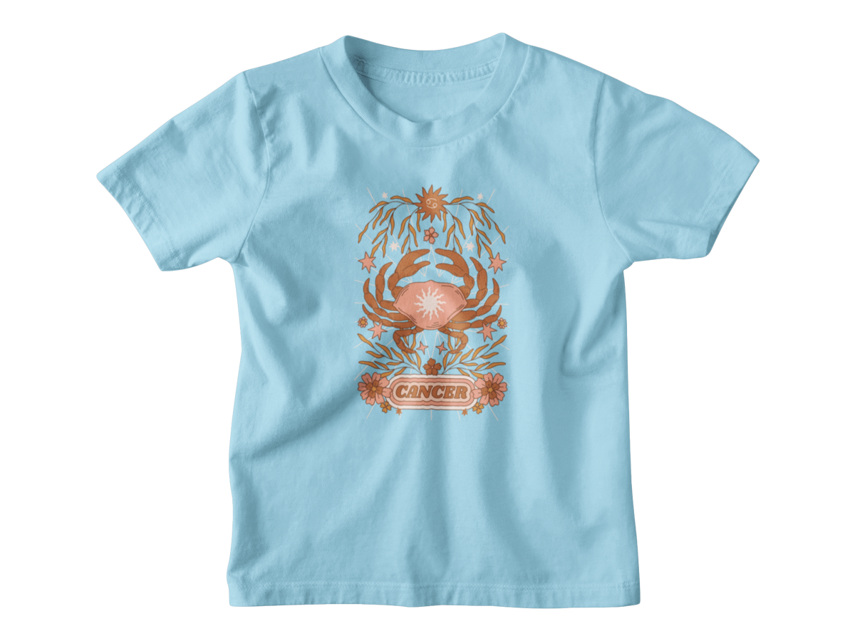 A light blue short-sleeve kids t-shirt featuring a central graphic of a Cancer astrology symbol, in a tarot card style.