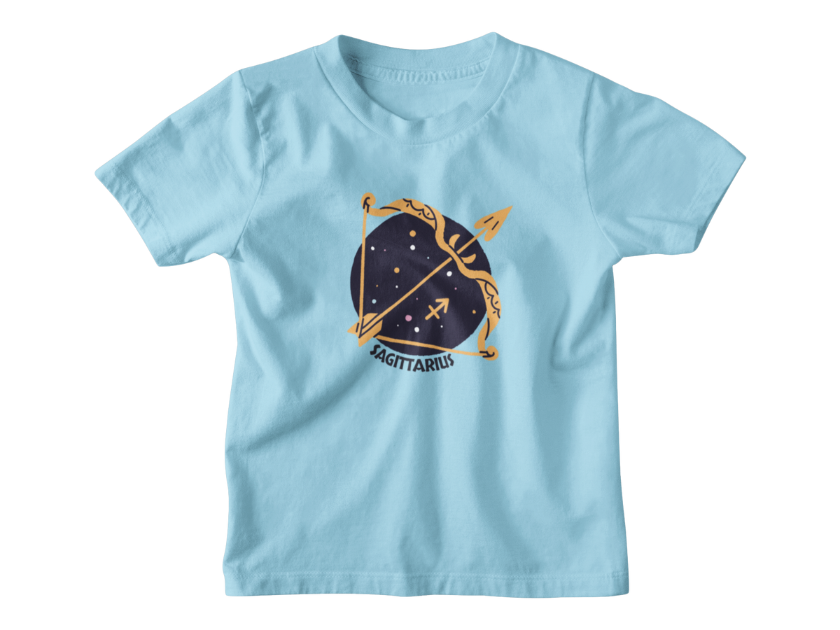 A blue short-sleeve kids t-shirt featuring a Sagittarius zodiac golden bow and arrow set against a dark navy blue starry circle, with the word &
