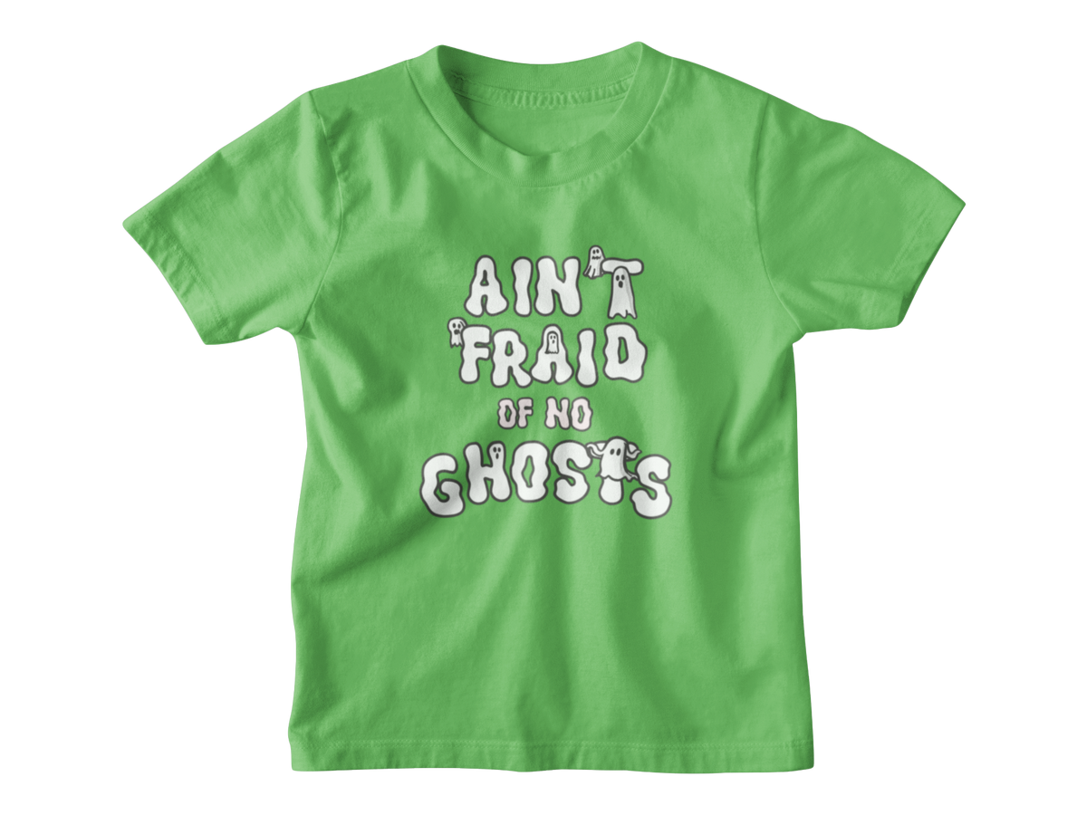 A green short-sleeve kid t-shirt with a white graphic Halloween text print that reads &