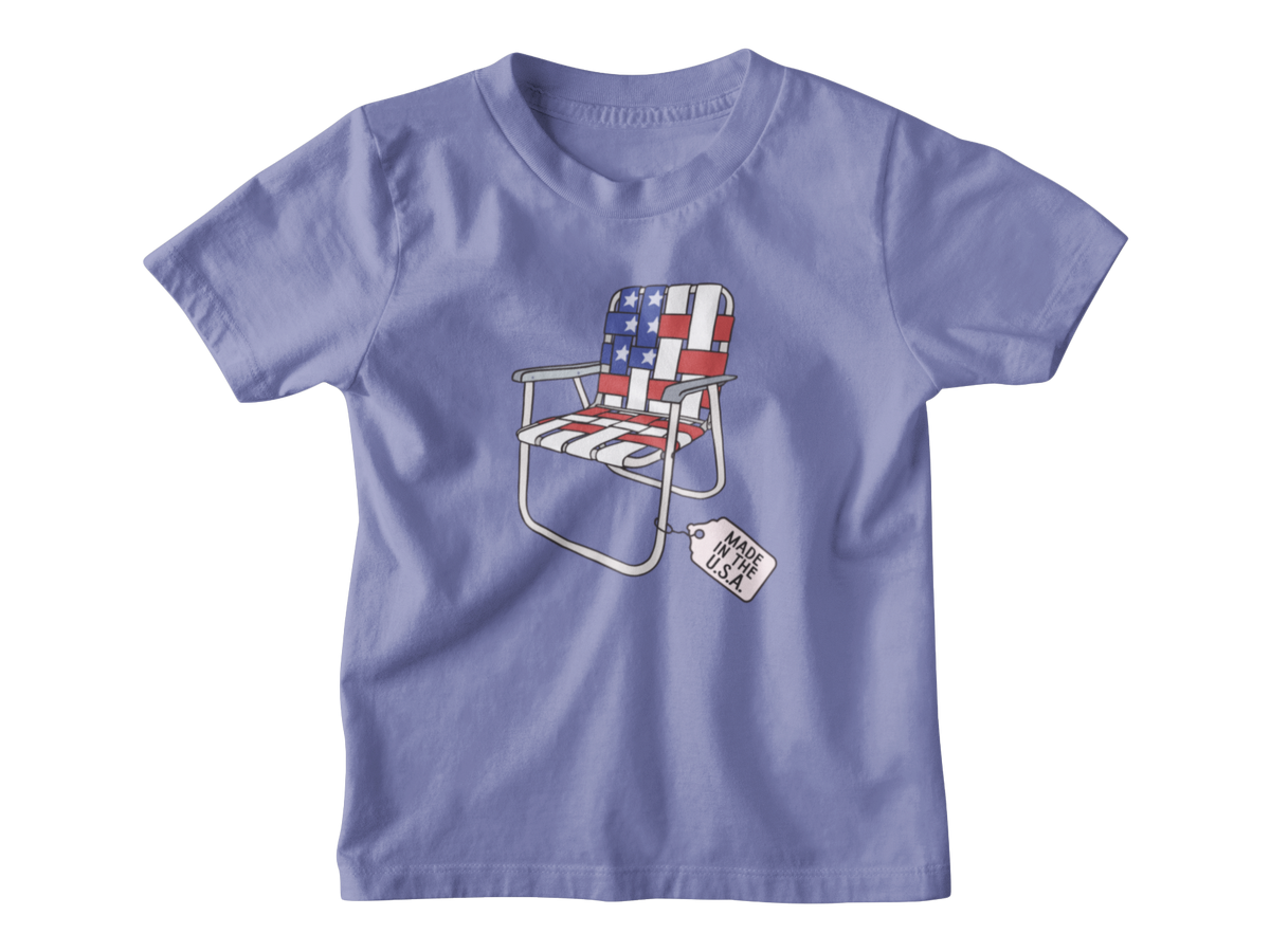A violet short-sleeve kids t-shirt for 4th of July with a folding lawn chair featuring an American flag pattern, with a &