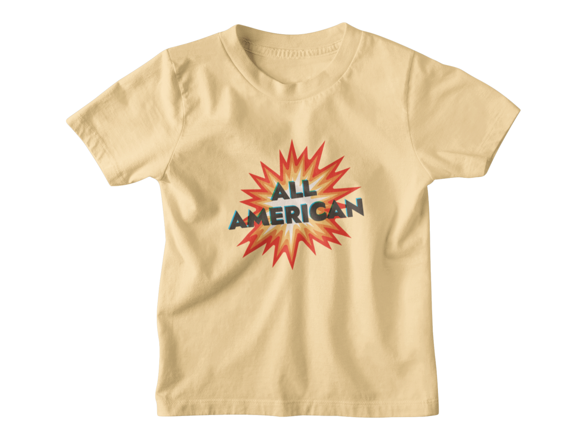 A yellow short-sleeve kids t-shirt with a graphic on the chest featuring a 4th of July firework with the text &
