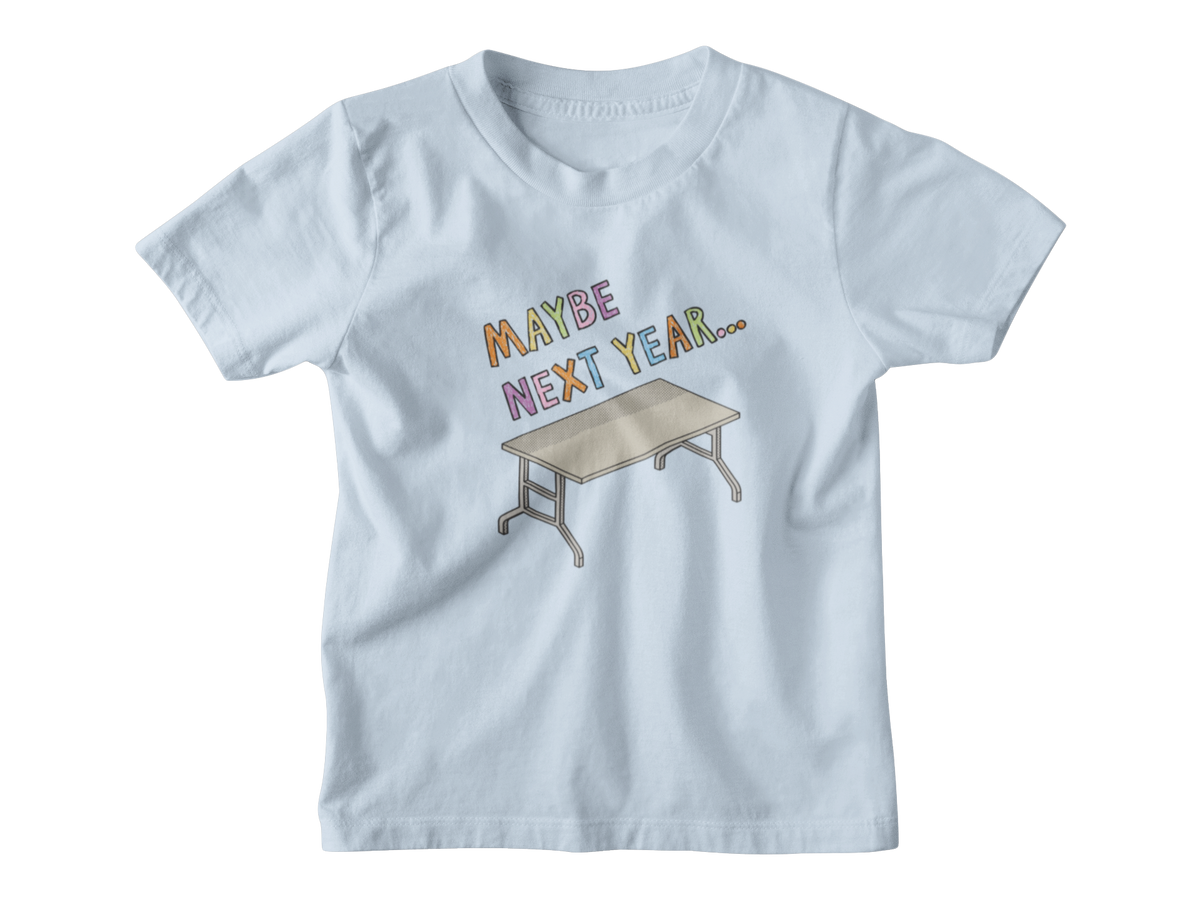 A light blue short-sleeve kids t-shirt with a graphic print on the front that reads &