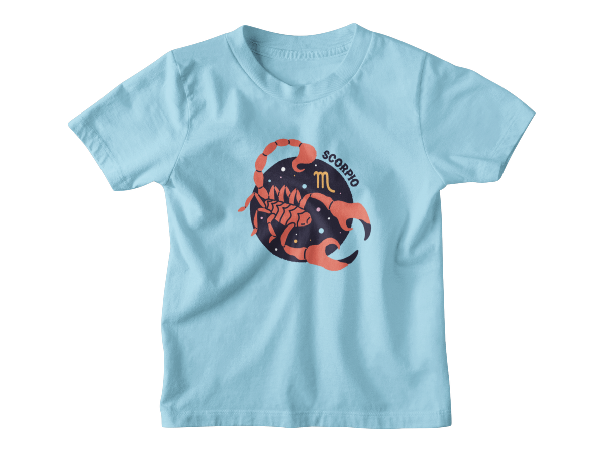 A light blue short-sleeve kids astrology t-shirt with a graphic of a scorpion inside a starry circle, featuring the word &
