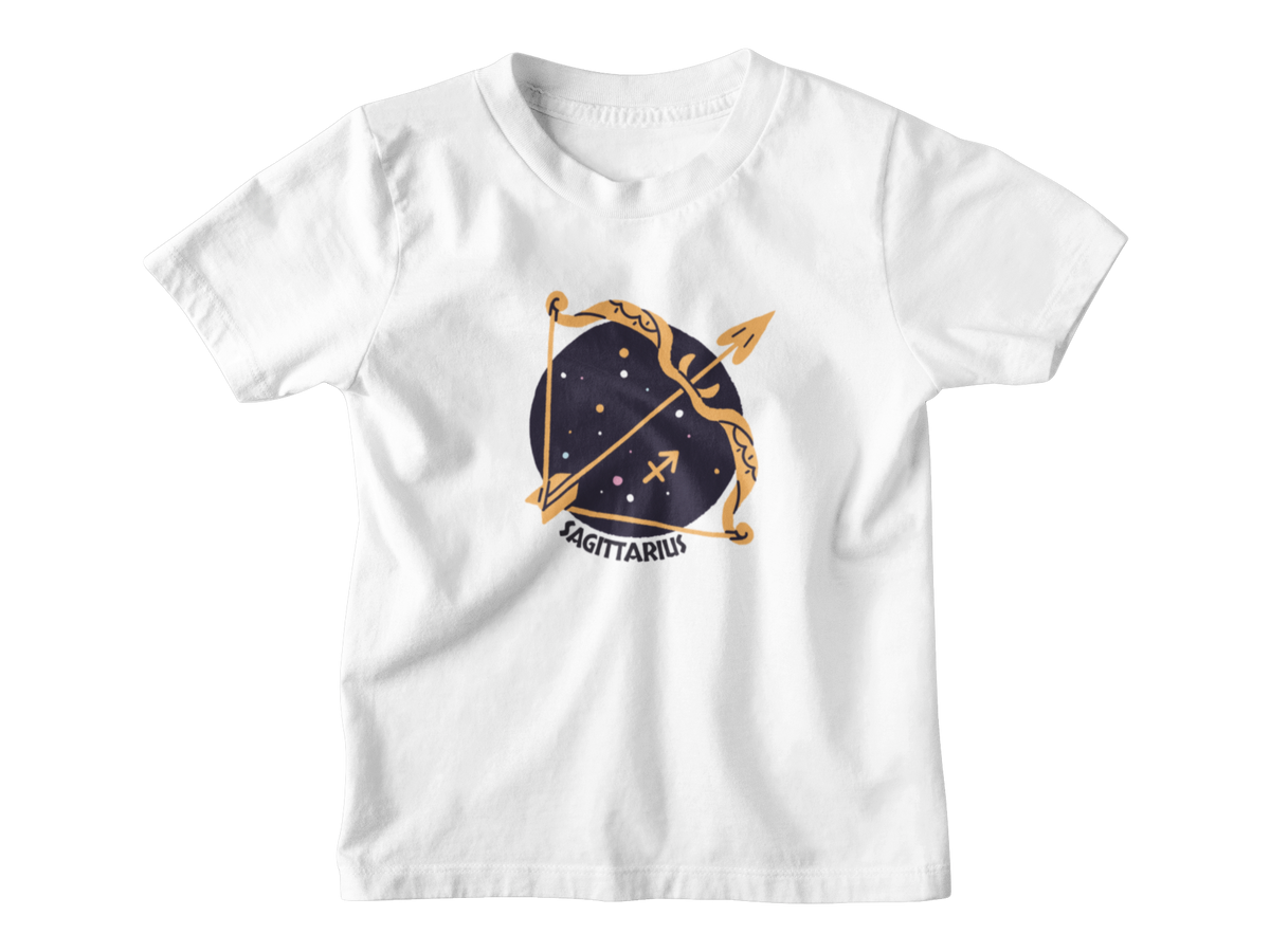A white short-sleeve kids t-shirt featuring a Sagittarius zodiac golden bow and arrow set against a dark navy blue starry circle, with the word &