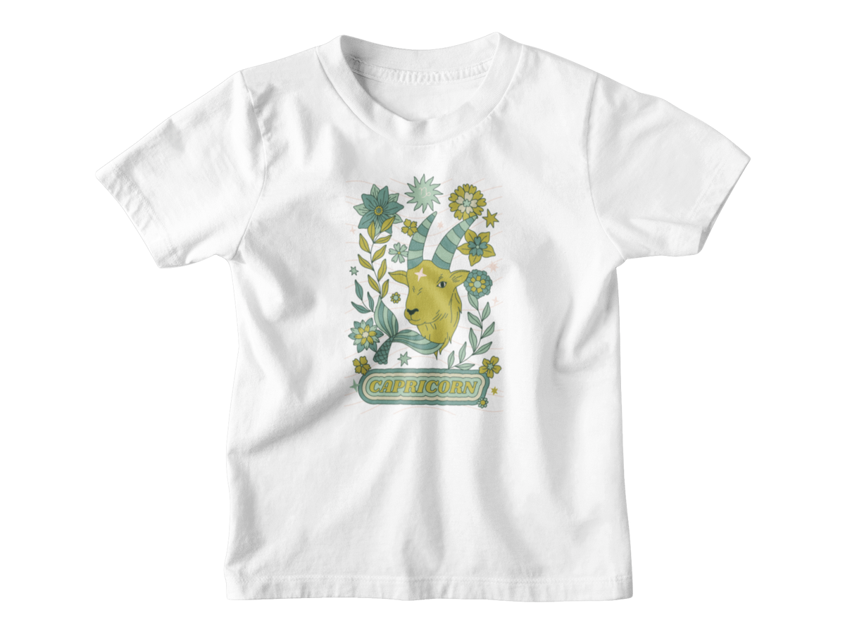 A white kids shirt for Capricorn astrology sign with a tarot goat.