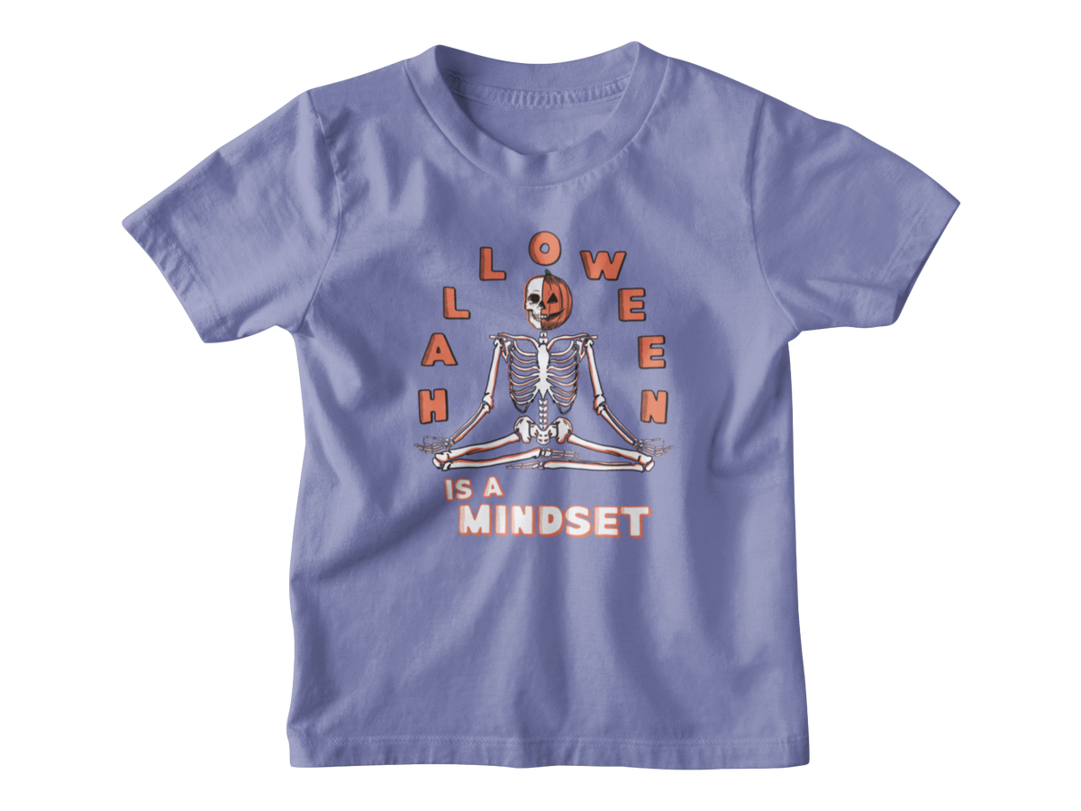 A purple short-sleeve kids Halloween t-shirt with a graphic on the front showing a skeleton meditating inside a jack-o&
