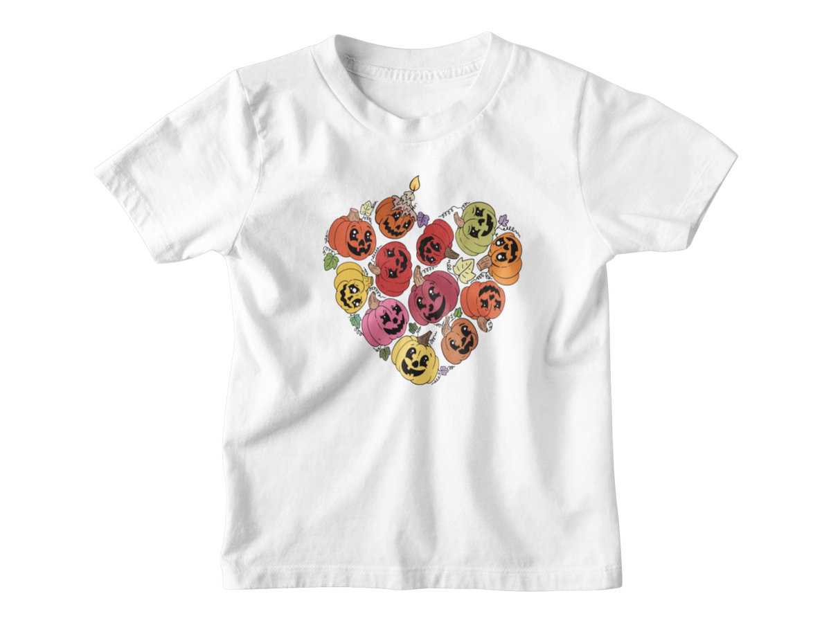 A white Halloween short-sleeve kids t-shirt with a heart-shaped graphic of smiling jack-o&