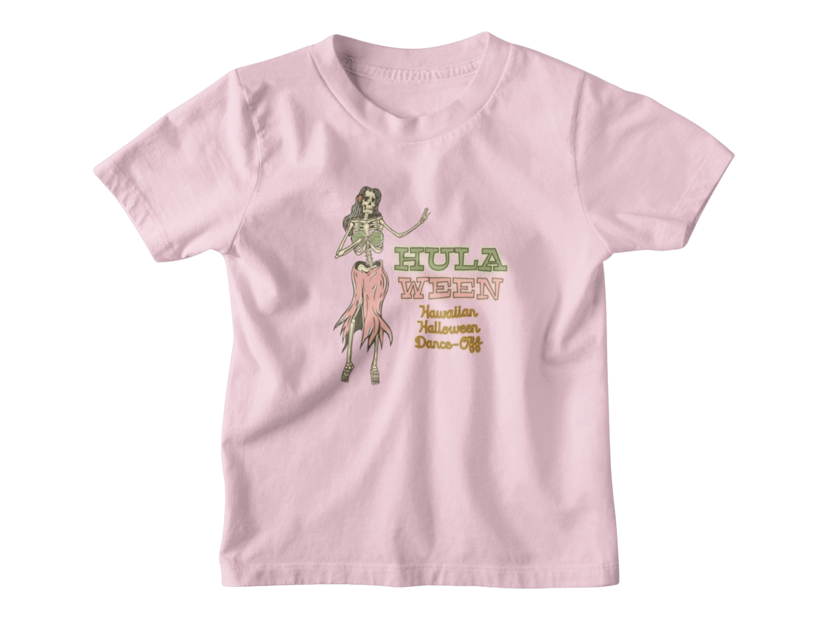 A light pink short-sleeve kid t-shirt with a graphic on the front showing a hula dancer and the text &