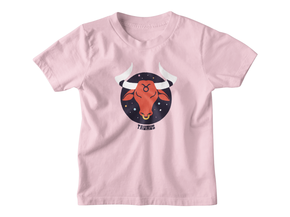 A pink short-sleeve kids t-shirt with a graphic of a red bull head inside a dark blue starry circle, labeled &