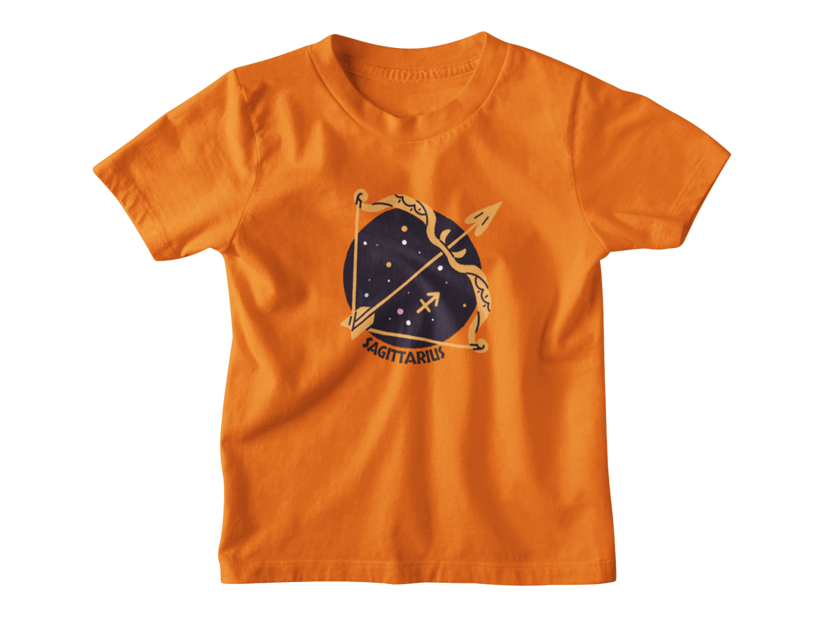 An orange short-sleeve kids t-shirt featuring a Sagittarius zodiac golden bow and arrow set against a dark navy blue starry circle, with the word &