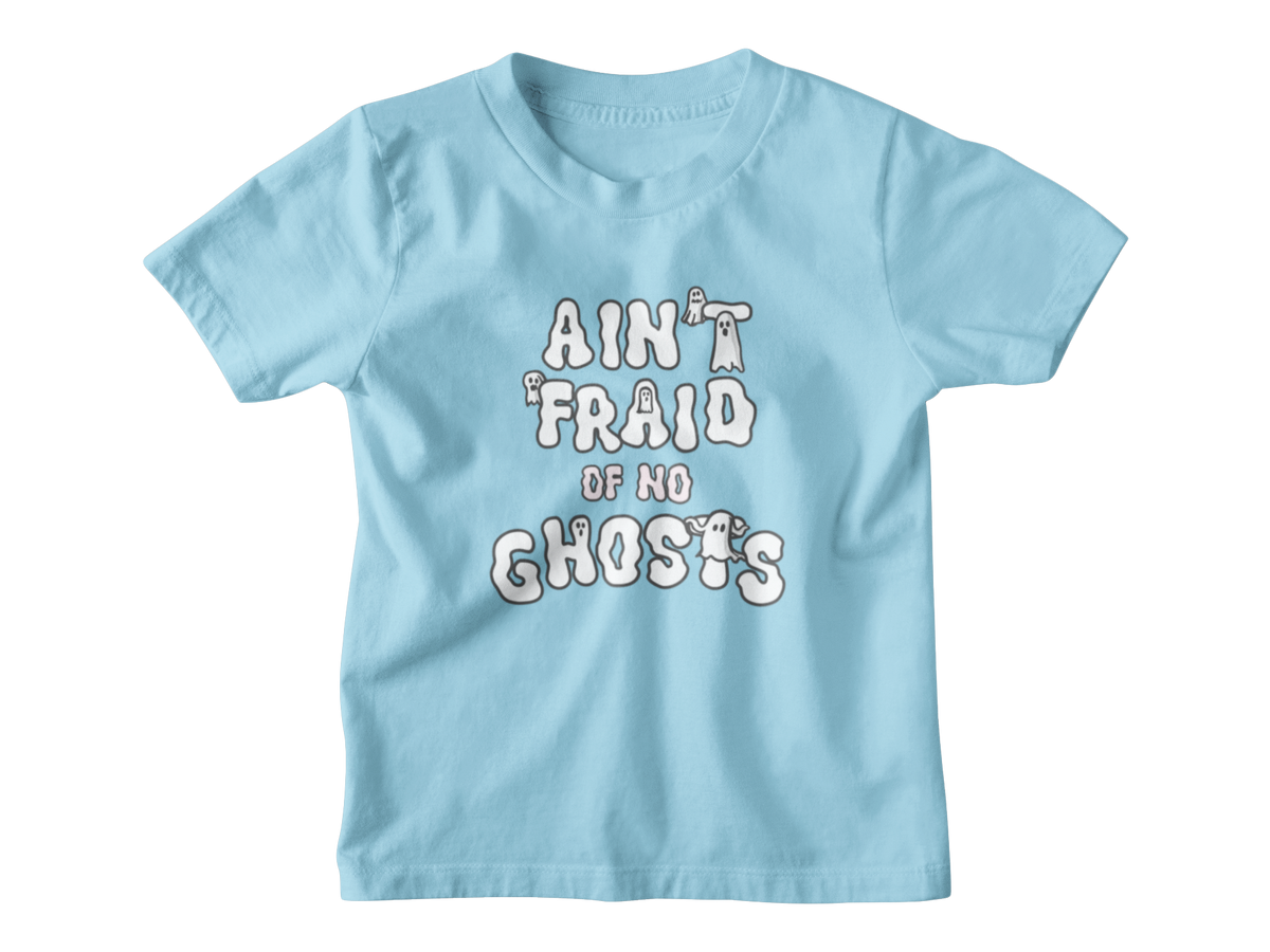 A blue short-sleeve kid t-shirt with a white graphic Halloween text print that reads &