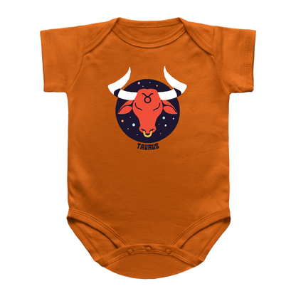 An orange infant onesie with a colorful retro graphic on the chest that reads &