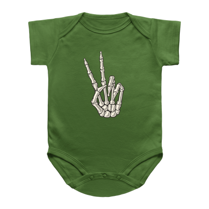 A green short-sleeve infant onesie featuring a skeleton hand graphic making a peace sign on the chest.