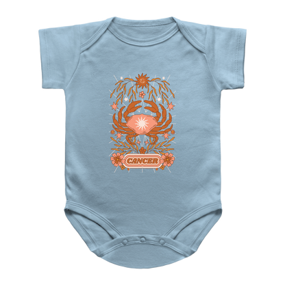 A light blue baby infant bodysuit featuring a tarot style orange and pink crab graphic with the word &