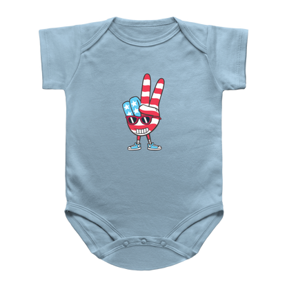 A light blue short-sleeve 4th of July baby bodysuit featuring a cartoon graphic of a hand making a peace sign with red and white stripes and blue accents, set against a plain white background.