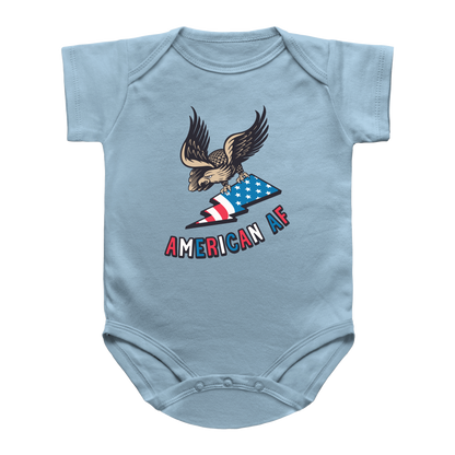 A light blue short-sleeve baby bodysuit for 4th of July featuring a graphic of an eagle holding an American flag with the text &