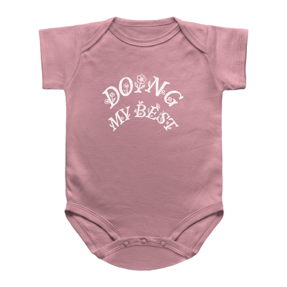 A pink short-sleeve infant bodysuit with &
