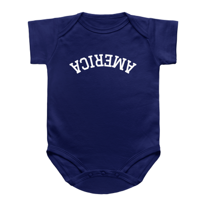 A short-sleeve baby onesie for 4th of July in dark blue with the word &
