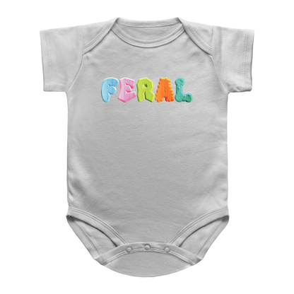 A white infant bodysuit featuring the word &