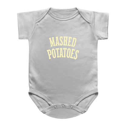 A white infant onesie with &