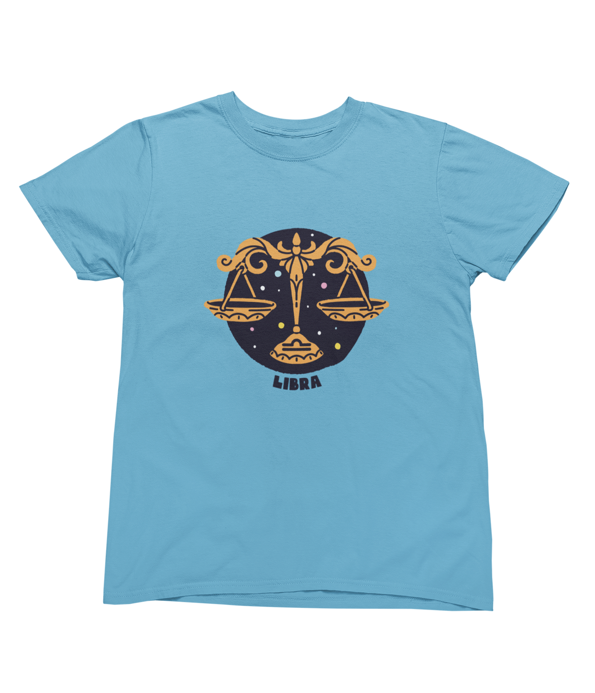 A light blue short-sleeve toddler crewneck t-shirt featuring a Libra zodiac sign graphic on the chest. The graphic depicts a gold Libra scale of justice set against a dark navy blue circular background with stars, and the word &